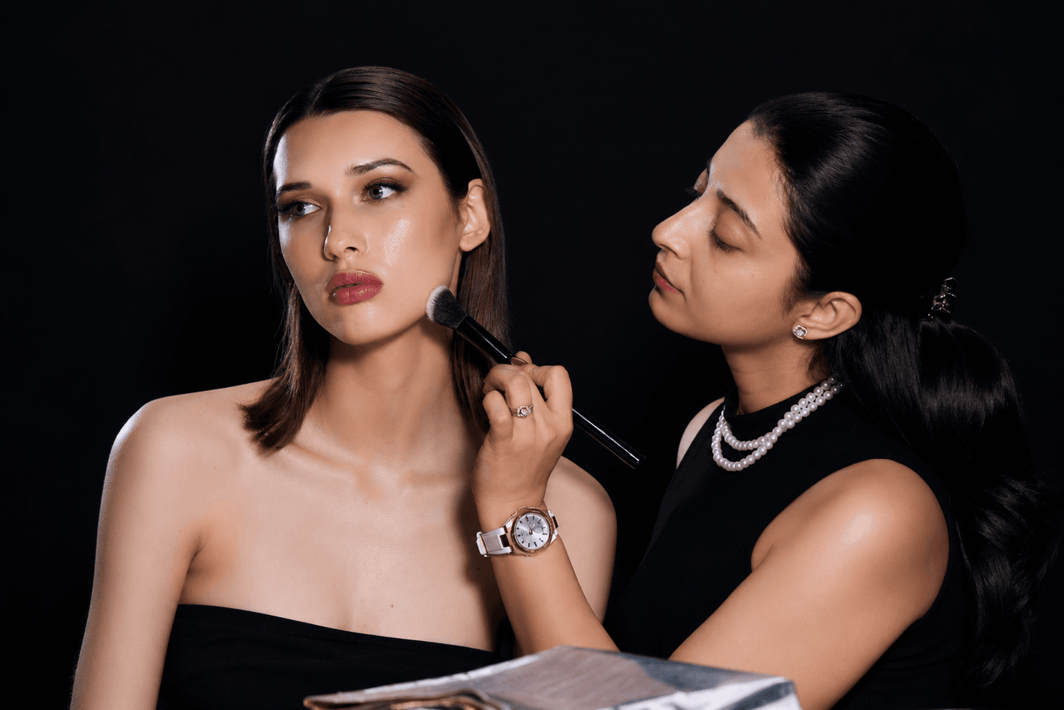 Tanya Thakur applying bridal makeup at a destination wedding
